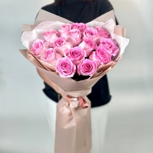 A bouquet of 15 pink roses
